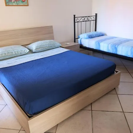 Trilocale In Baia Centro Apartment